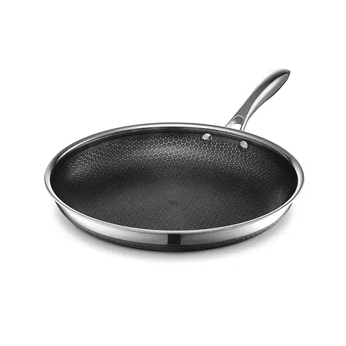 HexClad hybrid non-stick pan on gas stove