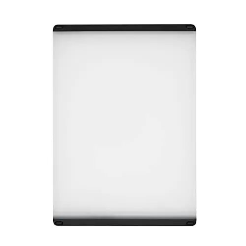 OXO Good Grips plastic utility cutting board with non-slip feet and clear surface