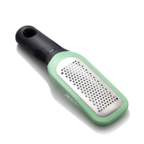 OXO green ginger and garlic grater with etched teeth
