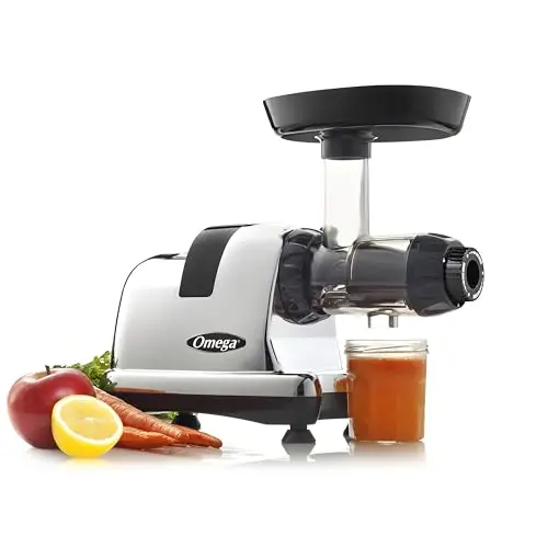 Omega chrome cold press juicer with wheatgrass and vegetables