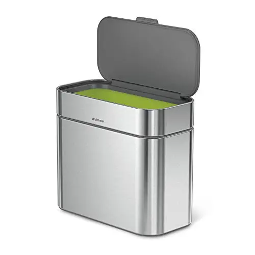 simplehuman brushed stainless steel compost caddy attached to trash can