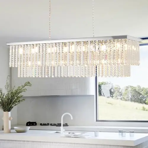 Arotikee rectangular chrome crystal chandelier with multiple lights over a dining table